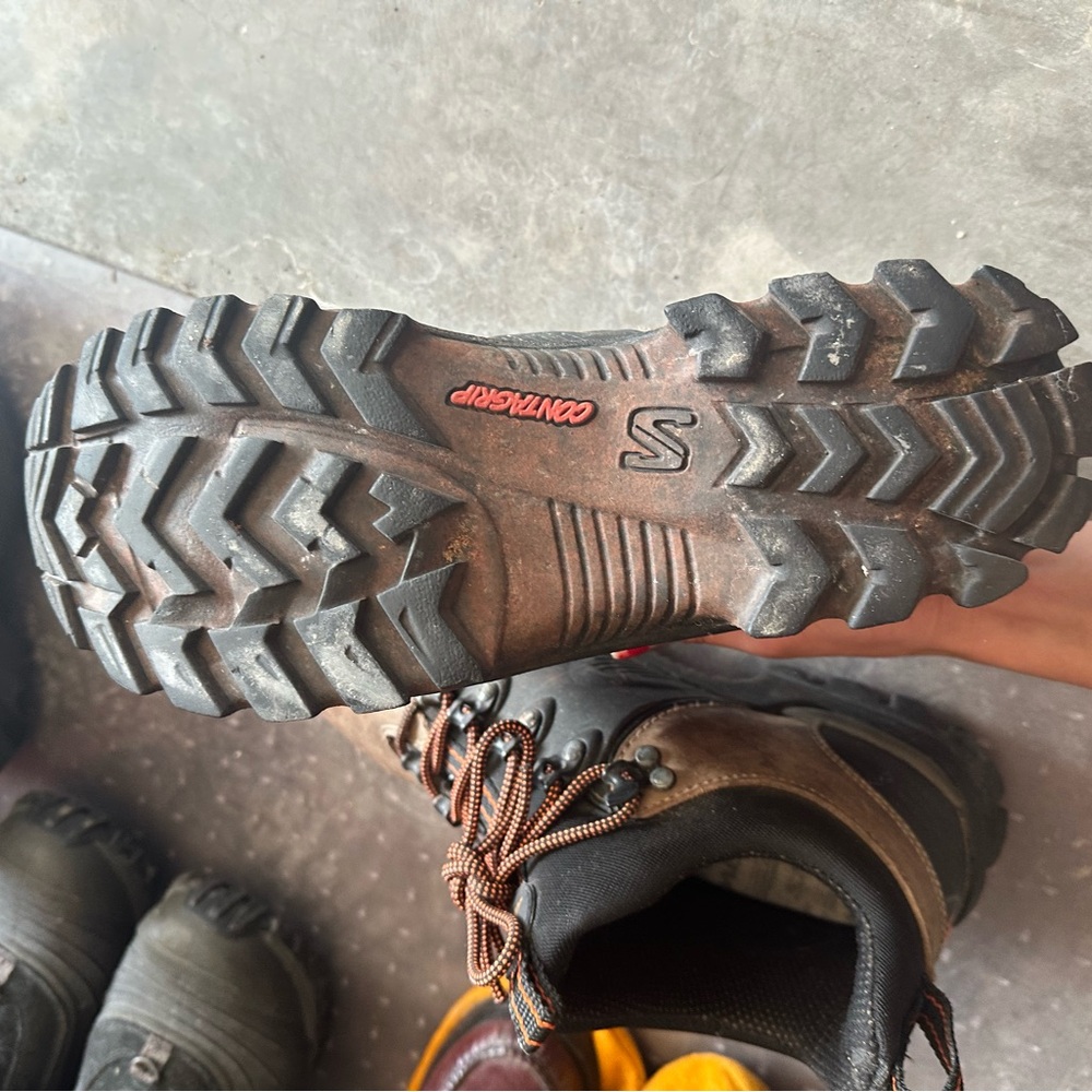 Brown and Black Heavy-Duty Boots with Aggressive Tread